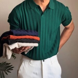 Green Trico linen shirt with short sleeves, styled with white pants